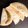 Piadina romagnola ripiena con friarielli e salsiccia artigianale Piadina romagnola ripiena con friarielli e salsiccia artigianale