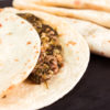 Piadina romagnola ripiena con friarielli e salsiccia artigianale Piadina romagnola ripiena con friarielli e salsiccia artigianale