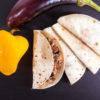 Piadina romagnola ripiena all’ortolana e salsiccia artigianale Piadina romagnola ripiena all’ortolana e salsiccia artigianale