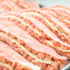 Tramezzini artigianali di carne scottona / maiale da allevamenti italiani ripieni al prosciutto e formaggio Tramezzini artigianali di carne scottona / maiale da allevamenti italiani ripieni al prosciutto e formaggio